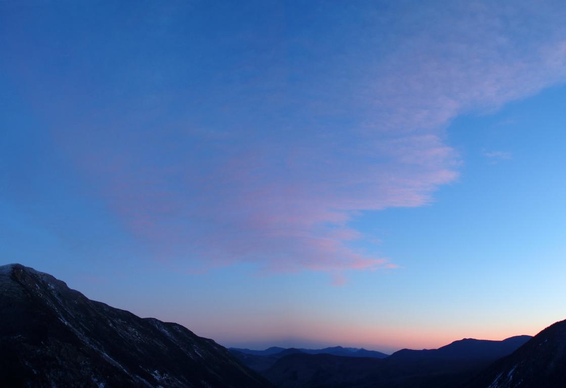 sunset above Crawford Notch in December as seen from Mount Willard in New Hampshire