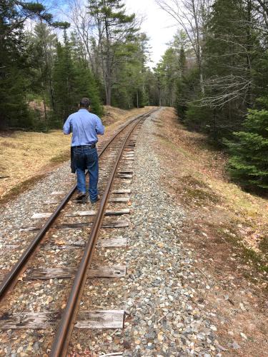 Martin walks the railway at Wiscasset Railroad in Maine