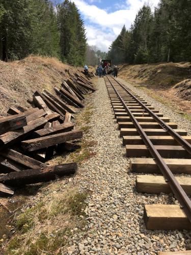 volunteers working on a new section of track at Wiscasset Railroad in Maine