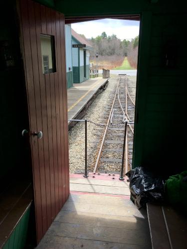 start of the restored railroad track as seen from inside the caboose at Wiscasset Railroad in Maine