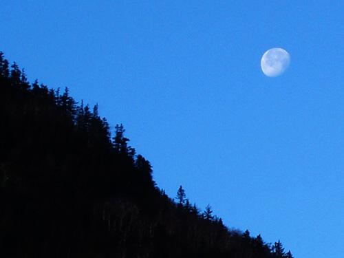moonset over the shoulder of Mount Blue in New Hampshire