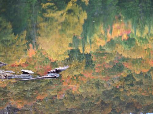 October color reflected on Pleiad Lake at Worth Mountain in northern Vermont