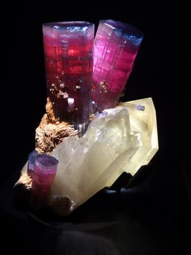 Elbaite (Tourmaline) on Quartz crystals on display at the Houston Museum of Natural History in Texas
