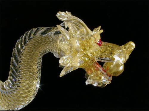 glass-and-gold dragon made at the glass blowing facotry on the island of Murano near Venus in Italy