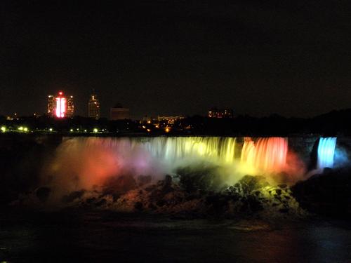 colored-light night view of the American Falls as seen from the Canadian side of Niagara Falls
