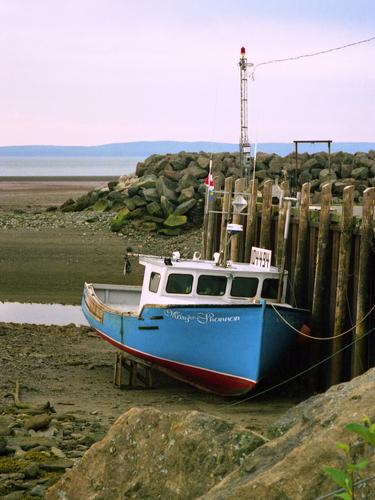 grounded boat at low tide in Nova Scotia in June 1998