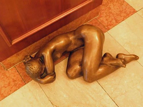 sleeping statue on the floor at the Prague Palace Hotel in the Czech Republic