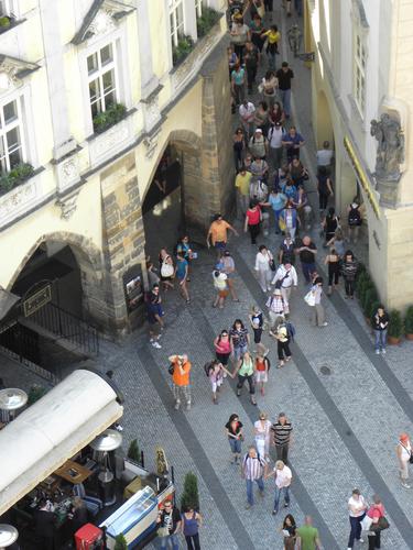 tourists entering Prague's Old Town Square in the Czech Republic