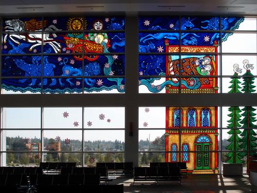 beautifully painted windows inside the airport at Seattle in Washington