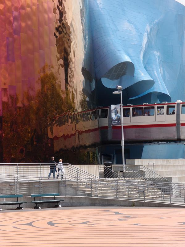 the fantastical EMP building with an exiting monorail train at Seattle in Washington