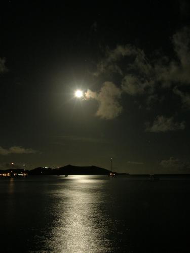 moonset over the ocean as seen from Grand Case at St. Martin in the Bahamas