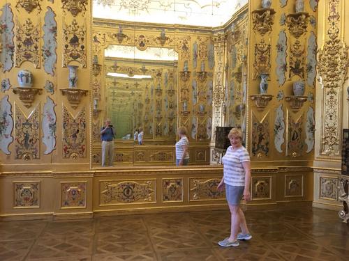 Andee's photo in the mirror room at Belvedere Palace in Vienna, Austria