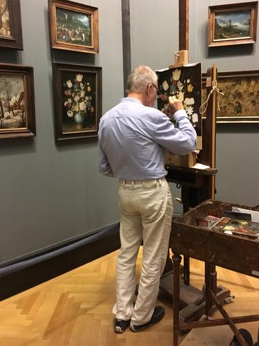 a painter copying a piece of art at the Museum of Fine Arts in Vienna, Austria