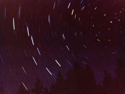 long-exposure star-track photo from Round Pond on the Allagash Wilderness Waterway in northern Maine