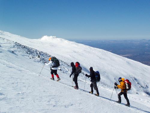 winters hikers on the way up to Mount Adams in the White Mountains of New Hampshire