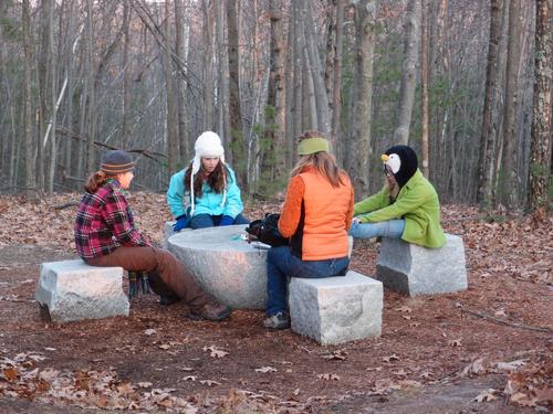 visitors at an outdoor exhibit at Andres Institute of Art in New Hampshire