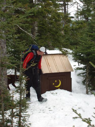 snow-buried outhouse at the lean-to on South Baldhead Mountain in New Hampshire