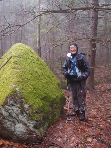 hiker on ridge to Bald Sunapee mountain in New Hampshire