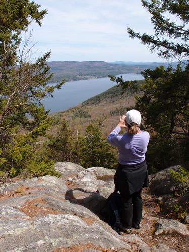 hiker on Bear Mountain near Newfound Lake in New Hampshire