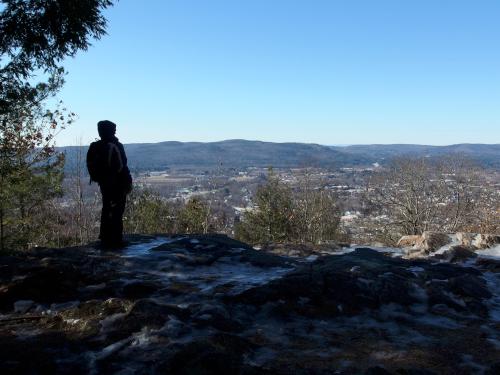 westerly view in January of Keene and distant Vermont mountains from Beech Hill in New Hampshire