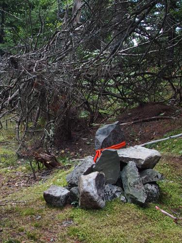 cairn on the summit of Black Snout North Mountain in the Ossipee Range in central New Hampshire