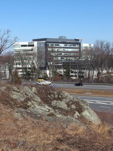 highrise building across Route 3 from Burlington Landlocked Forest in eastern Massachusetts