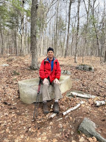 Fred in March on the Stone Sitting Spot in Calitri Conservation Area in southern NH