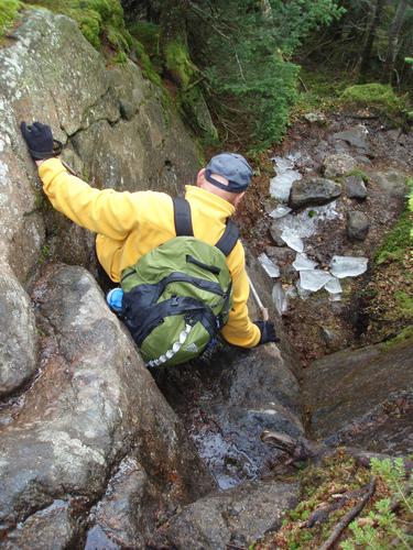 hiker going down the Carter-Moriah Trail in New Hampshire