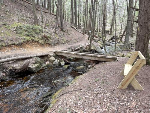 footbridge in April at Cascade Trail in southern NH