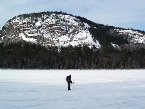 Len crosses Echo Lake toward White Horse Ledge at Echo Lake State Park in New Hampshire