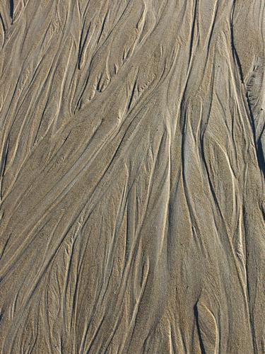 abstract pattern in the sand at low tide on Crane Beach in Massachusetts