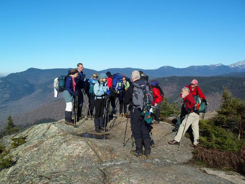 hikers on the summit of Mount Crawford in New Hampshire