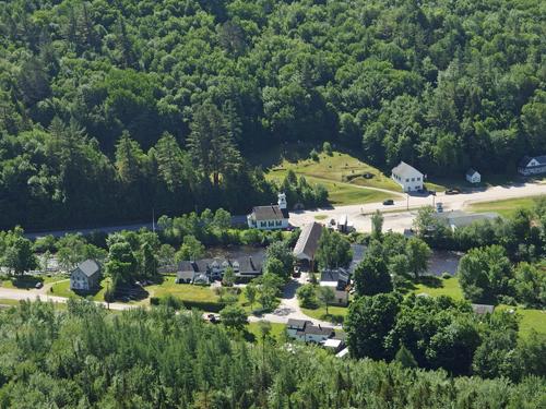 view from Devils Slide of the small town of Stark nestled beside the Upper Ammonoosuc River and Route 110 in northern New Hampshire