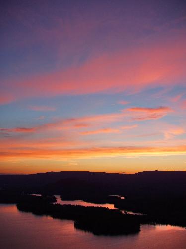 sunset over Squam Lake as seen from Eagle Cliff