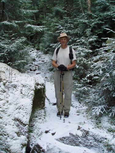 hiker on the Greenleaf Trail to Eagle Cliff in New Hampshire