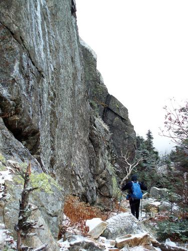 hiker on the Greenleaf Trail to Eagle Cliff in New Hampshire