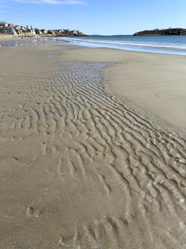 beach art in March at Good Harbor Beach in eastern MA