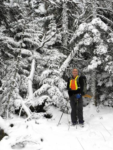 a hiker in the snow on Gore Mountain in Vermont