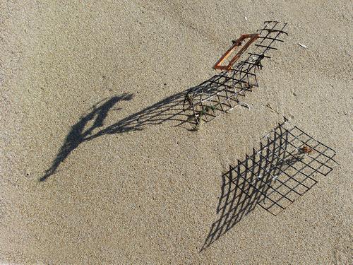 lobster trap in the sand at Hampton Beach in New Hampshire