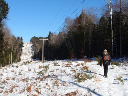 Dick heads up the powerline swath on the way to Holbrook Hill at Bedford in southern New Hampshire