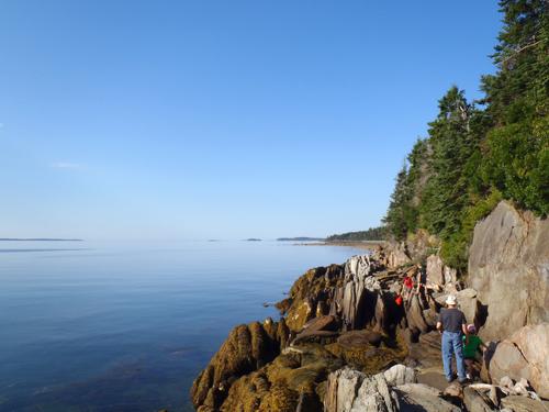 Anthony, Carl, David and Talia climb around Gull Point on Islesboro Island in Maine