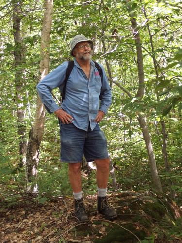 Lance stands on a near-summit bump on Jones Hill at Pillsbury State Park in New Hampshire