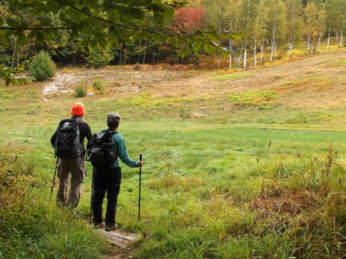 hikers on the trail to Kidder Mountain in southern New Hampshire