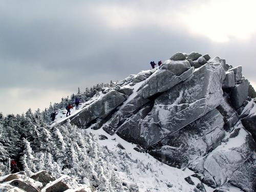 January hikers ascend to the summit of Mount Liberty in the White Mountains of New Hampshire