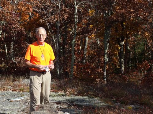 Fred picks up trash atop Little Watatic Mountain in northeastern Massachusetts