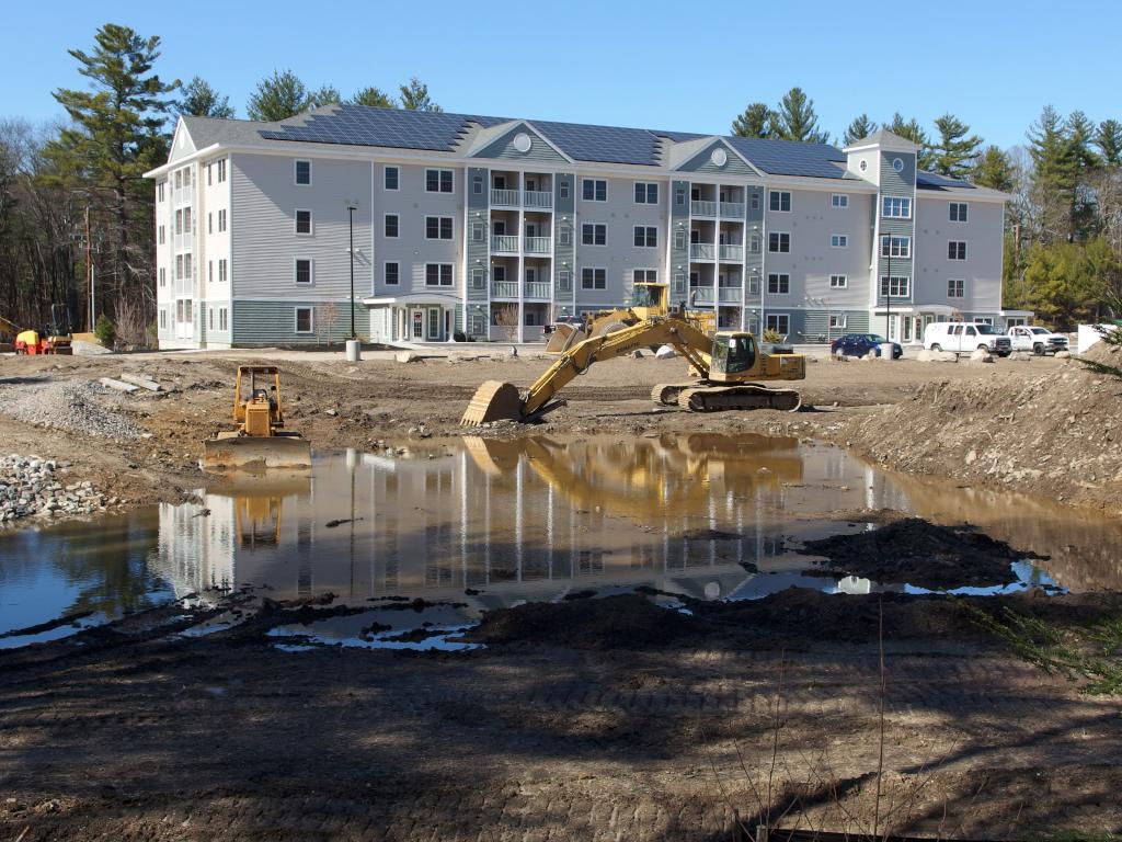 residential building under construction next to Londonderry Rail Trail in southern New Hampshire