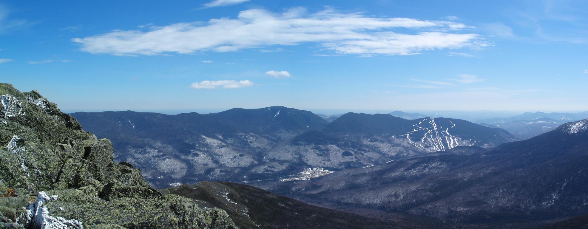 panoramic view in March of the Carter-Wildcat Range from Mount Madison in the White Mountains of New Hampshire