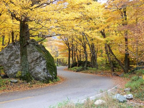 gorgeous fall foliage where Route 108 threads through Smugglers Notch in Vermont