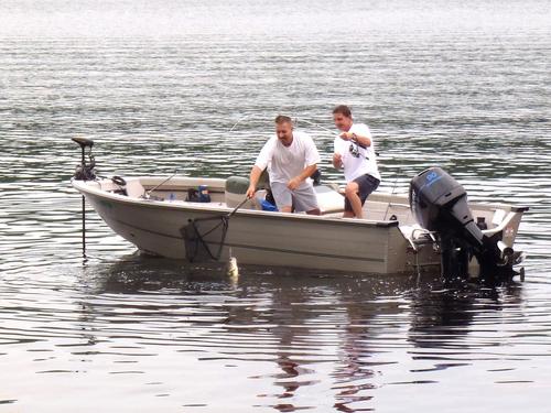 fishermen off Battery Point at Massabesic Audubon Center in New Hampshire