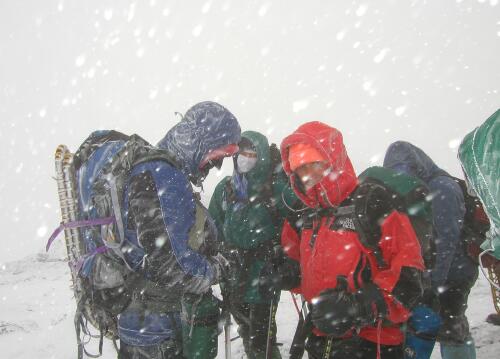 winter hikers on Mount Monroe in New Hampshire